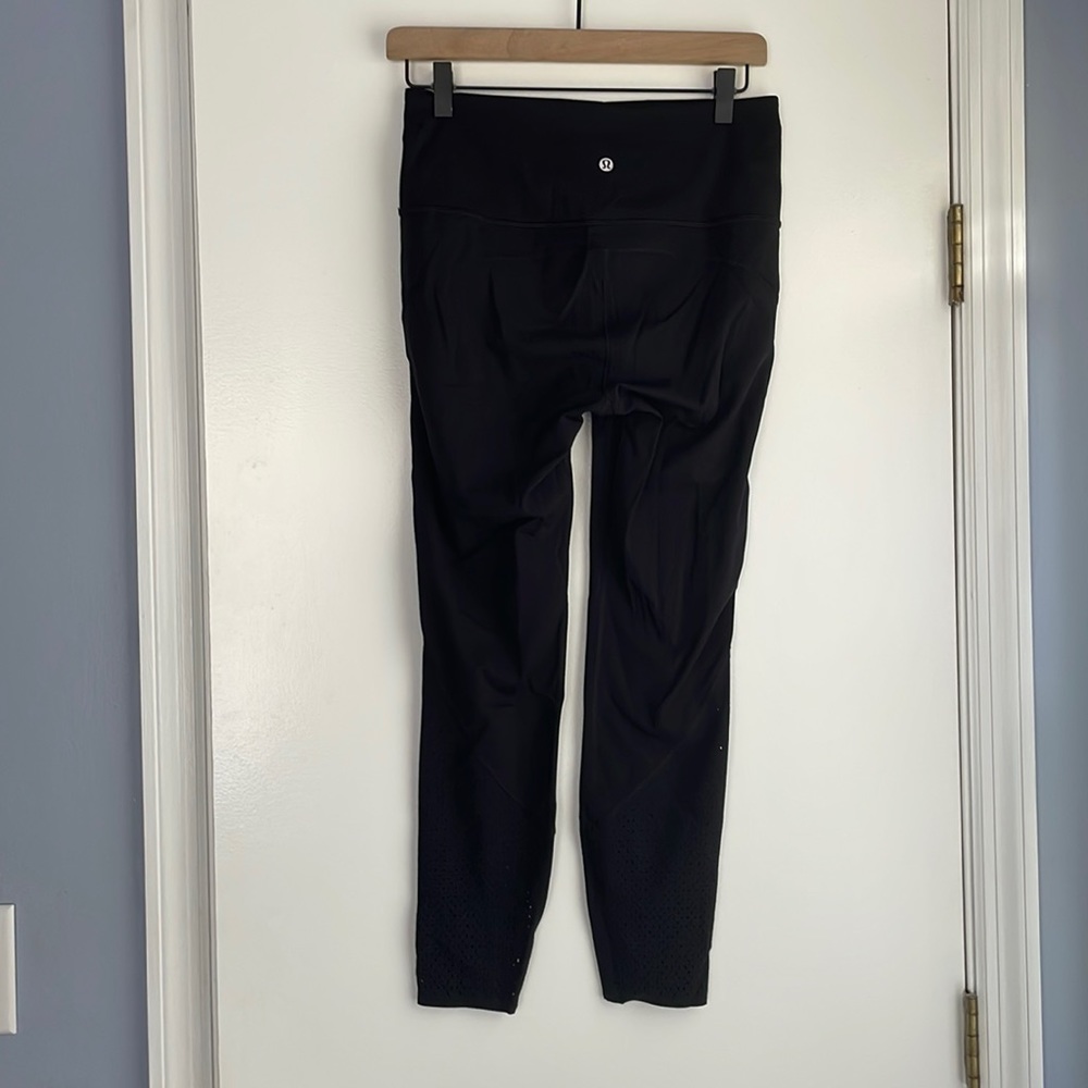 Lululemon black running leggings sz 8 with ankle calf mesh and waist pocket